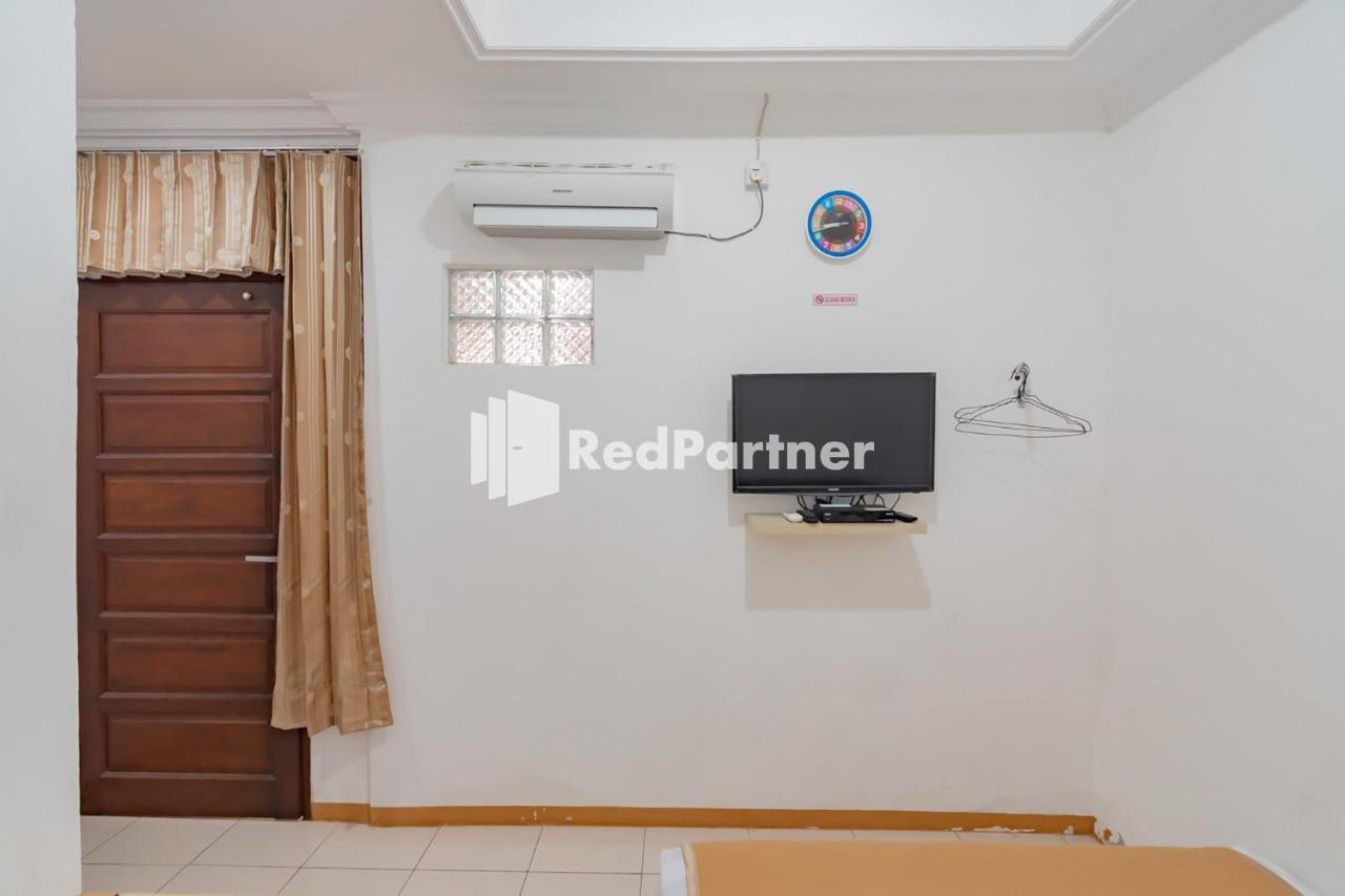 Langkar Guest House Syariah Mitra Reddoorz Samarinda Exterior foto