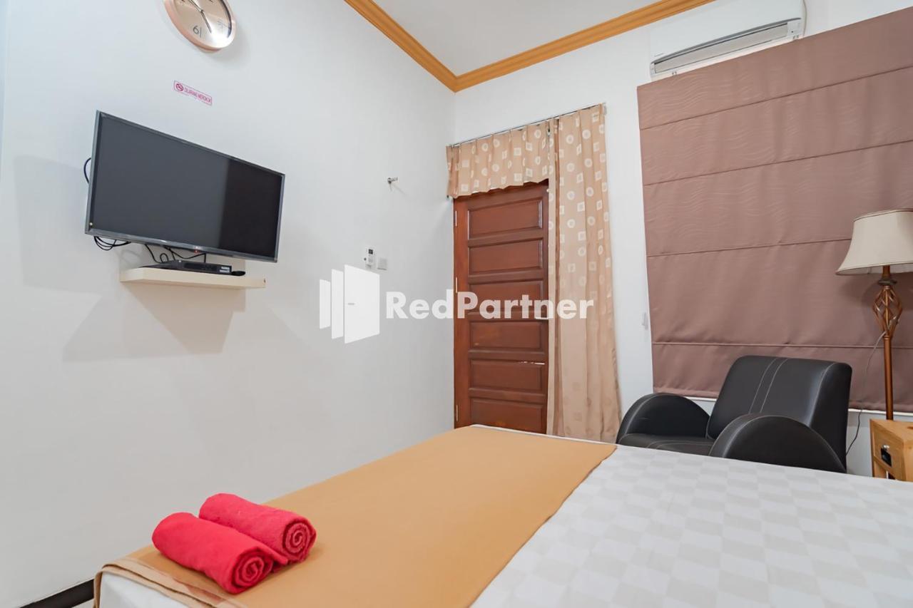 Langkar Guest House Syariah Mitra Reddoorz Samarinda Exterior foto